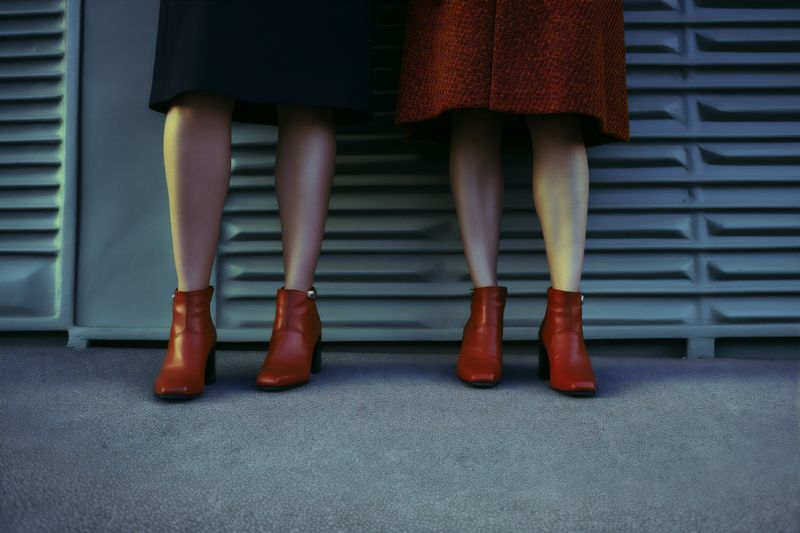 fashion woman fashionable beautiful leg shoe foot concept blue colorful red. Generative AI.