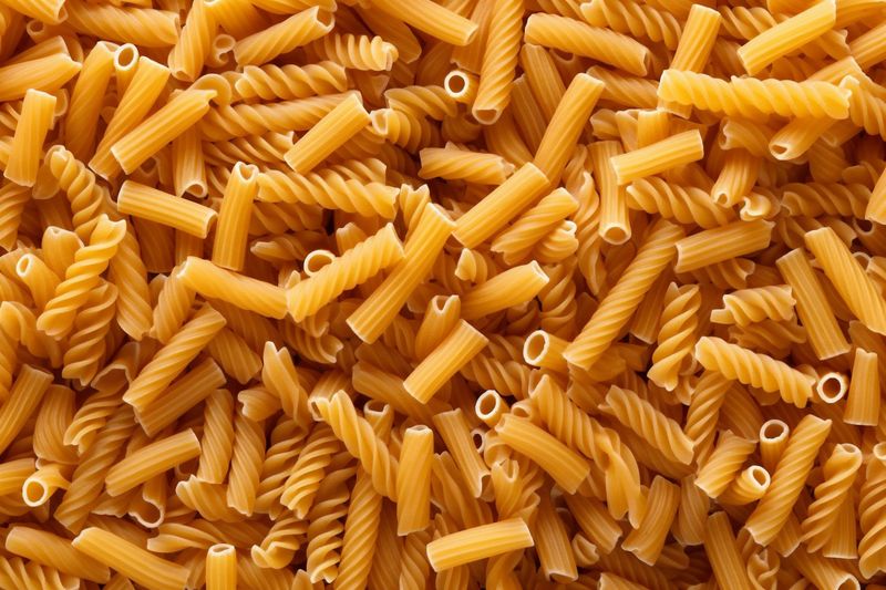 healthy raw macaroni uncooked food spaghetti background italian lunch ingredient pasta. Generative AI.