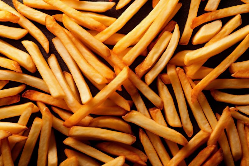 food fry junk background snack tasty potato fat chip french meal. Generative AI.