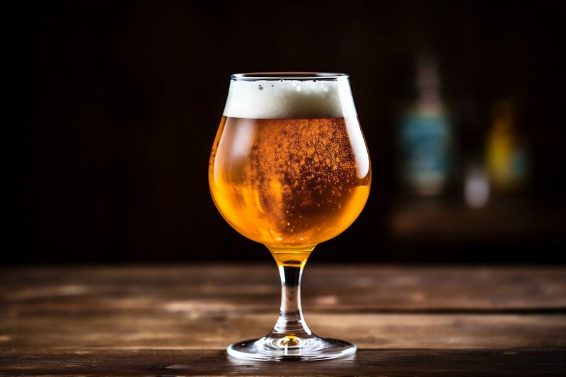 foam pint glass alcohol pub lager gold beer drink beverage. Generative AI.