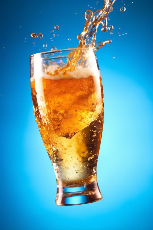 drink gold splash foam cold gradient beer alcohol bubble glass background. Generative AI.