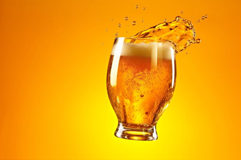 cold bubble glass beer drink gradient background splash pub alcohol foam. Generative AI.