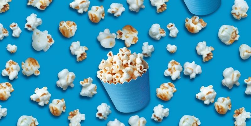 food corn white pop snack entertainment cinema popcorn background blue box. Generative AI.